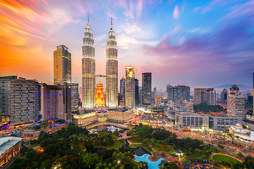 Kuala Lumpur city skyline at dusk representing the future of leadership